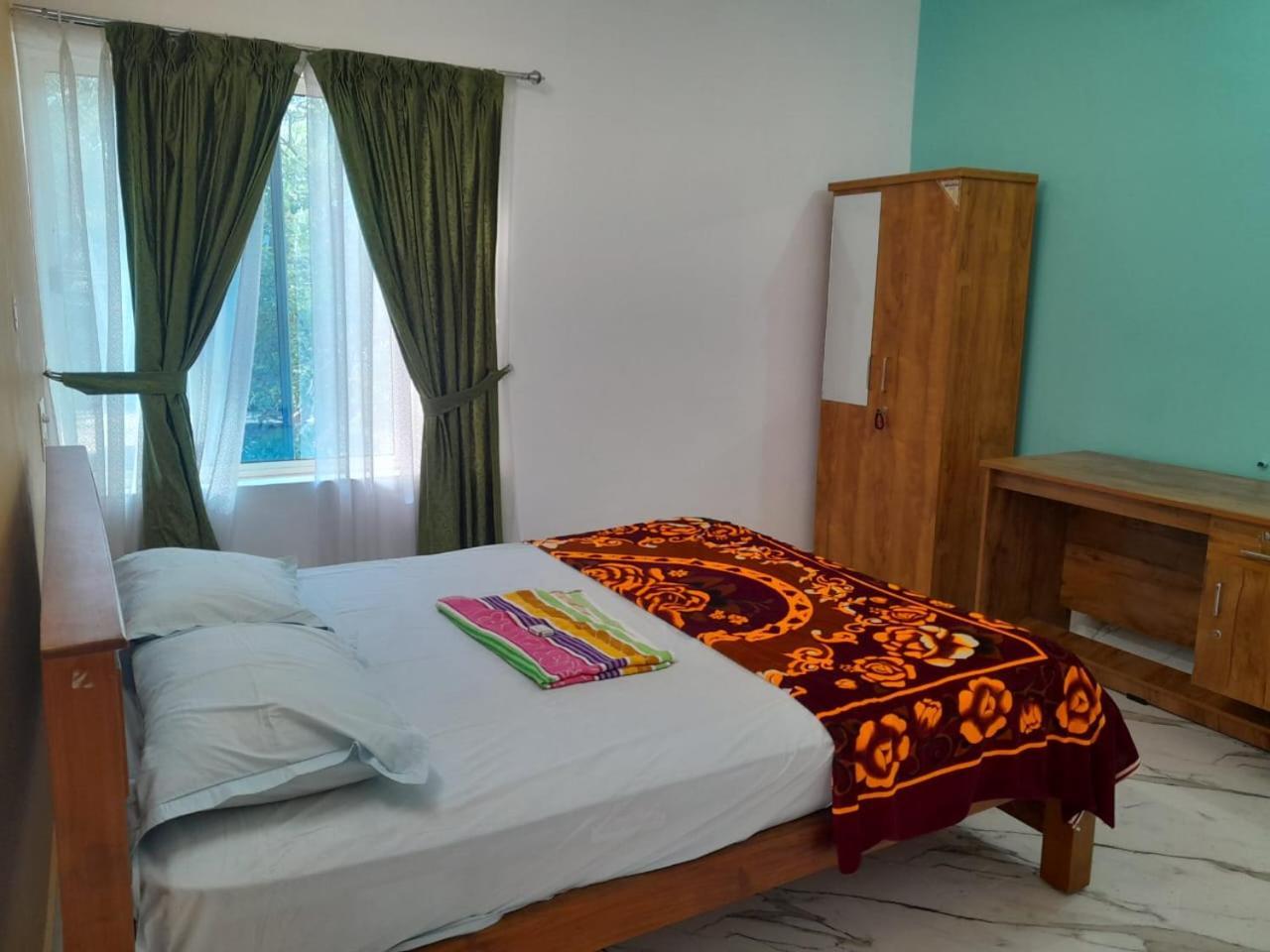 Dilkush Munroe Homestay โกลลัม ภายนอก รูปภาพ